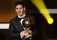 Lionel Messi holds the trophy during the FIFA Ballon d'Or awards ceremony in Zurich on January 7, 2013